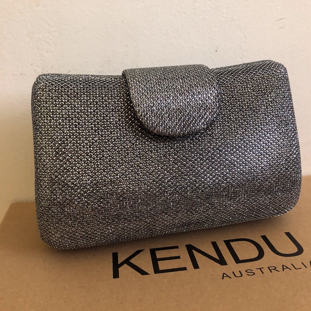 Cruise Club NWT Silver Metallic clutch